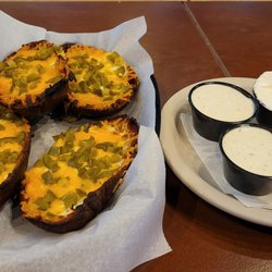 Eddy's Sports Pub - Potato skins with jalapenos instead of bacon bits. Ranch / sour cream on the side.