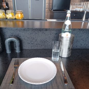 Sally’s Apizza - Nice setup at a low seat (ADA compliant) in the bar with some bottled water. - Pizza Near Me - Wethersfield, Connecticut Sally’s Apizza - Nice setup at a low seat (ADA compliant) in the bar with some bottled water. - Pizza Near Me - Wethersfield, Connecticut