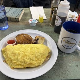 Chicken Fajita Omelette with English muffin, blueberry/lemon cake and homemade strawberry preserves. And a fine cup of coffee.