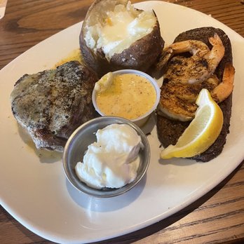 Outback Steakhouse - Filet with grilled shrimp and baked potato - Steakhouses Near Me - Daytona Beach, Florida Outback Steakhouse - Filet with grilled shrimp and baked potato - Steakhouses Near Me - Daytona Beach, Florida