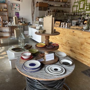 Lucky Tree - a table with bowls and plates on it - Art Galleries Near Me - Raleigh, North Carolina Lucky Tree - a table with bowls and plates on it - Art Galleries Near Me - Raleigh, North Carolina