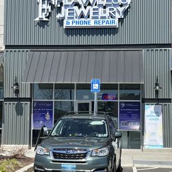 Flawless Jewelry & Phone Repair - Front of store, next to Publix