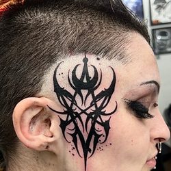 Atomic Tattoo & Body Piercing - By Jon