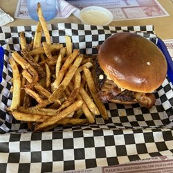Rock-A-Fellas Sports Grille - Cajun burger, smoked bacon and blue cheese