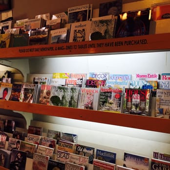 Downtown Subscription - a shelf of magazines and magazines - Coffee & Tea Near Me - Santa Fe, New Mexico