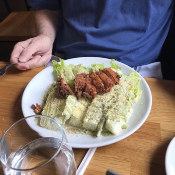 Emmy Squared Pizza - Upper East Side - Delicious and beautifully presented Caesar salad with crispy chicken. - Pizza Near Me - New York, New York Emmy Squared Pizza - Upper East Side - Delicious and beautifully presented Caesar salad with crispy chicken. - Pizza Near Me - New York, New York