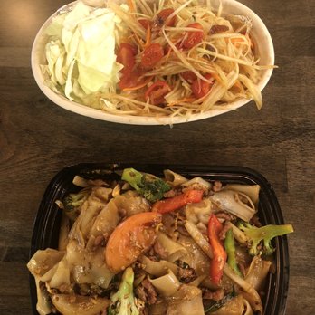 Zaap Kitchen Lao Thai Street Eats - 08. Green Papaya Salad (top) 20. Pad Kee Mao Drunken Noodles (bottom) - Laotian Near Me - Dallas, Texas Zaap Kitchen Lao Thai Street Eats - 08. Green Papaya Salad (top) 20. Pad Kee Mao Drunken Noodles (bottom) - Laotian Near Me - Dallas, Texas