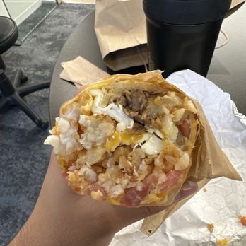 The Trough Sandwich Kitchen - Here you can perfectly see the skimpy ratio, this is how the burrito came cut in half. - Sandwiches Near Me - Irvine, California The Trough Sandwich Kitchen - Here you can perfectly see the skimpy ratio, this is how the burrito came cut in half. - Sandwiches Near Me - Irvine, California