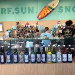 Some of the many flavors on display and a glimpse of the cheery, bright, surf-inspired interior