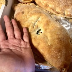 Calabria Pizzeria - Look at the size of this calzone...and this is the smaller of the 2!