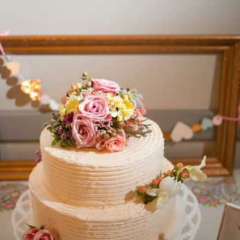 Flirt With Dessert - a wedding cake with flowers on top - Bakeries Near Me - Savannah, Georgia Flirt With Dessert - a wedding cake with flowers on top - Bakeries Near Me - Savannah, Georgia