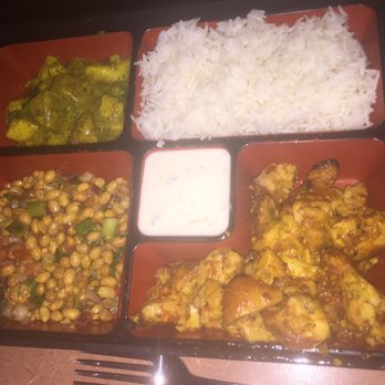 Gorkha Palace Indian Cuisine - Spicy Newari chicken. VERY spicy. Cute Bento box-like presentation with potato salad, soynut salad, rice, and raita. - Himalayan/Nepalese Near Me - Minneapolis, Minnesota Gorkha Palace Indian Cuisine - Spicy Newari chicken. VERY spicy. Cute Bento box-like presentation with potato salad, soynut salad, rice, and raita. - Himalayan/Nepalese Near Me - Minneapolis, Minnesota