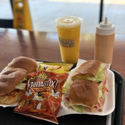 Torta de chicharrón and Original torta with Mango juice
