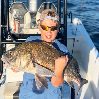 Florida Boy Adventures - Lucas with his biggest fish to date, a black drum. - Fishing Near Me Florida Boy Adventures - Lucas with his biggest fish to date, a black drum. - Fishing Near Me