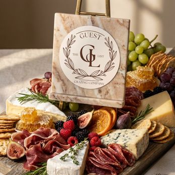 The Guest List Grazing - Charcuterie board with artisan cheeses, cured meats, fruit, and honeycomb, styled by The Guest List Grazing Co. - Caterers Near Me The Guest List Grazing - Charcuterie board with artisan cheeses, cured meats, fruit, and honeycomb, styled by The Guest List Grazing Co. - Caterers Near Me