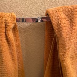 Simply Clean OC - They broke the towel rack and tried to hide it with the towel placed over it.