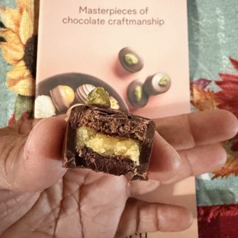 Läderach - Hit both pralines and truffles all were delish. The coconut stood out most - Chocolatiers & Shops Near Me - Walnut Creek, California