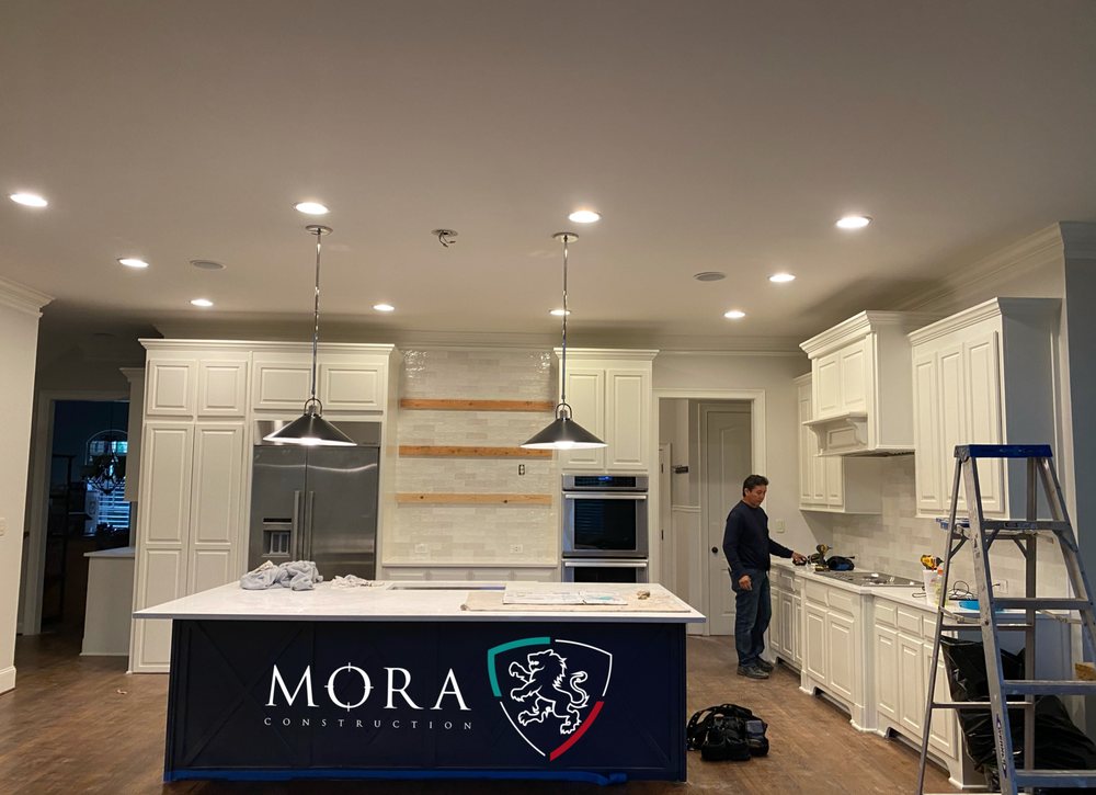 Slide of H.A Mora Painting, Roofing & Remodeling