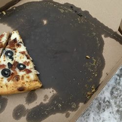 Domino's Pizza - We picked up pizzas at 510 pm and so much grease it stained the front seat.