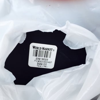 World Market - Barcode from mirror. The mirror has been bagged in plastic for disposal. - Home Decor Near Me - Austin, Texas