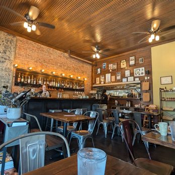 Skillet - Small dining area with a peek into the kitchen. - New American Near Me - Columbus, Ohio