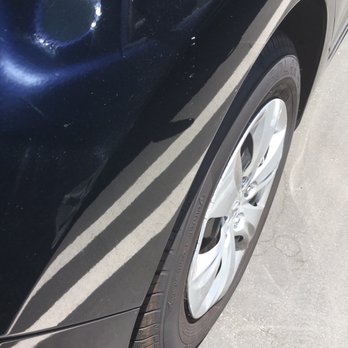 Conserv Fuel - a close up of a car's tire - Car Wash Near Me - Riverside, California