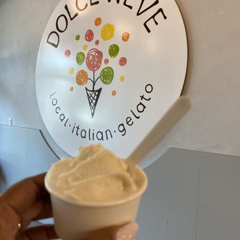 Dolce Neve - a hand holding a cup of ice cream - Gelato Near Me - Austin, Texas