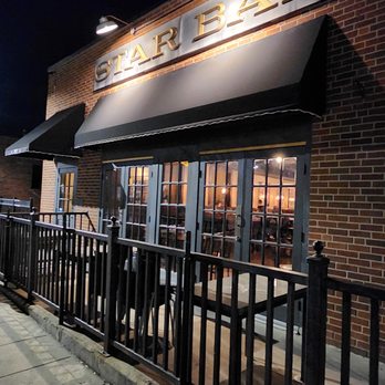 Star Bar - the outside of a restaurant at night - Sports Bars Near Me - Des Moines, Iowa Star Bar - the outside of a restaurant at night - Sports Bars Near Me - Des Moines, Iowa