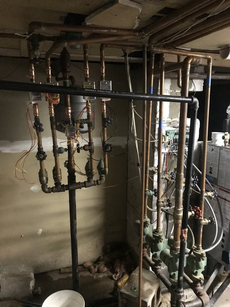 Slide of Mekons Plumbing & Heating Services