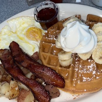 Blossom Trail Cafe - Pecan banana waffles w 2 over medium eggs, bacon and potatoes - Breakfast & Brunch Near Me - Sanger, California Blossom Trail Cafe - Pecan banana waffles w 2 over medium eggs, bacon and potatoes - Breakfast & Brunch Near Me - Sanger, California