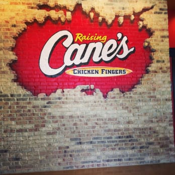 Raising Cane's Chicken Fingers - A wall near the register f Raising Caine's. - Fast Food Near Me - Broken Arrow, Oklahoma Raising Cane's Chicken Fingers - A wall near the register f Raising Caine's. - Fast Food Near Me - Broken Arrow, Oklahoma