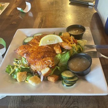 The Local's Eatery - Mixed greens salad topped with grilled grouper - Gastropubs Near Me - Niceville, Florida The Local's Eatery - Mixed greens salad topped with grilled grouper - Gastropubs Near Me - Niceville, Florida