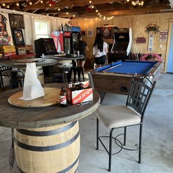 Coco Mango Island Grille - Inside seating and games.