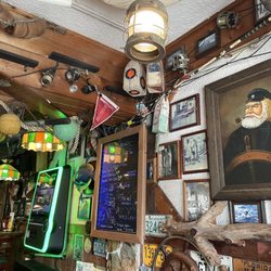 Briny Irish Pub - So much to see including this proud captain and lots of great fish catch photographs adorn the walls of this lively venue