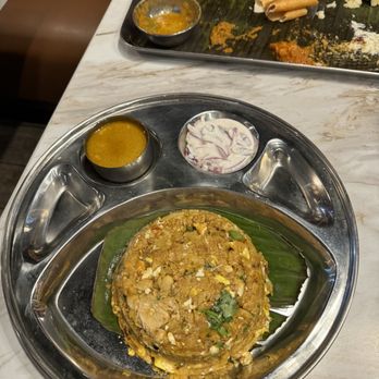 Madurai Mes Express - a plate of food on a table - Indian Near Me - Austin, Texas Madurai Mes Express - a plate of food on a table - Indian Near Me - Austin, Texas