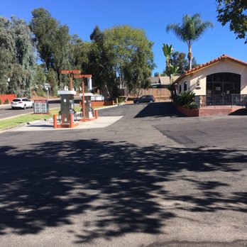 Market At the Ranch - a parking lot with a gas station in the background - Grocery Near Me - San Diego, California