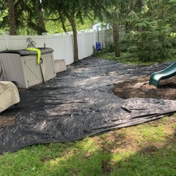 J&L Masonry & Landscape Designs - Weeds were fully ripped up then covered with fabric.