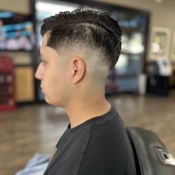 Moose's Barber Shop and Shave - Mid-high fade