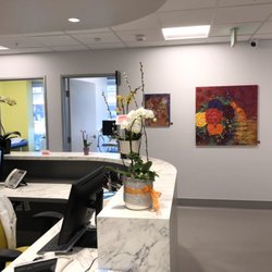 American Urgent Care Center - Our nurse station and hallways are full of bright colors and fresh flowers.