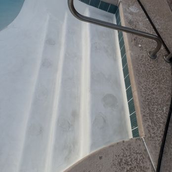 Backyard Pool Plastering Service & Repair - This is the patch job they did to remove the horrible tiles that were placed! That was confirmed or asked for !! - Pool & Hot Tub Service Near Me - Vail, Arizona Backyard Pool Plastering Service & Repair - This is the patch job they did to remove the horrible tiles that were placed! That was confirmed or asked for !! - Pool & Hot Tub Service Near Me - Vail, Arizona