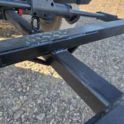 Weld shop - They crossed weld it and put gussets on the bike rack frame.