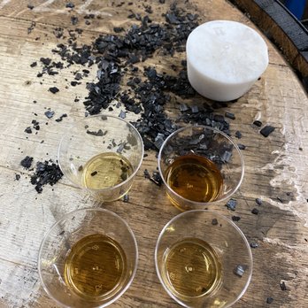 J Mattingly 1845 Distillery - a barrel of whiskey and four glasses of liquor - Distilleries Near Me - Frankfort, Kentucky