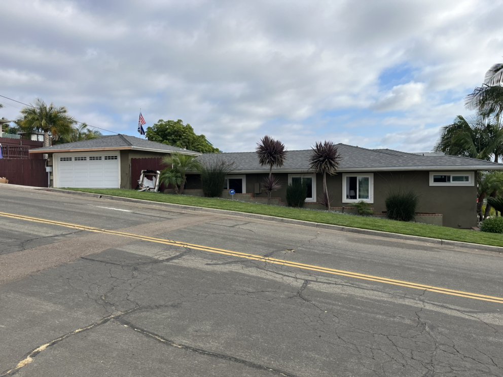 Slide of The Roofing Company