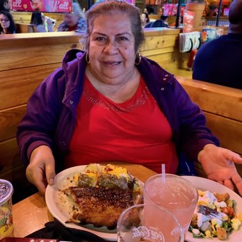 Texas Roadhouse - My mom enjoying her half slab of ribs and sides - Steakhouses Near Me - Oceanside, California Texas Roadhouse - My mom enjoying her half slab of ribs and sides - Steakhouses Near Me - Oceanside, California