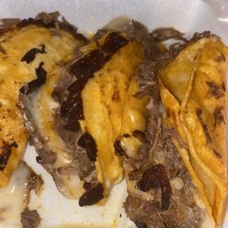 Birria tacos with cheese