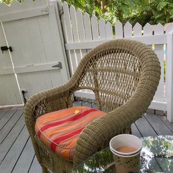 Tropical Inn - Table, two chairs, door to suite. - Bed & Breakfast Near Me - Key West, Florida Tropical Inn - Table, two chairs, door to suite. - Bed & Breakfast Near Me - Key West, Florida