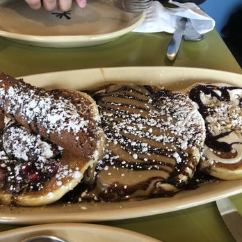 Snooze, an A.M. Eatery - Pancake flight- cannoli, peanut butter cup and blueberry danish pancakes - Breakfast & Brunch Near Me - Westminster, Colorado Snooze, an A.M. Eatery - Pancake flight- cannoli, peanut butter cup and blueberry danish pancakes - Breakfast & Brunch Near Me - Westminster, Colorado