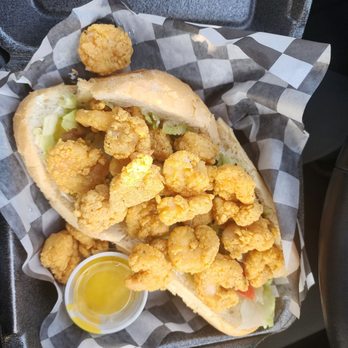 Lefort's Seafood - 10in shrimp poboy dressed. That's mustard in the cup. I like mustard on all sandwiches. - Seafood Markets Near Me - Marrero, Louisiana Lefort's Seafood - 10in shrimp poboy dressed. That's mustard in the cup. I like mustard on all sandwiches. - Seafood Markets Near Me - Marrero, Louisiana