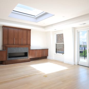 Cobblestone Management - an empty living room - General Contractors Near Me - Boston, Massachusetts Cobblestone Management - an empty living room - General Contractors Near Me - Boston, Massachusetts