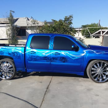 New Image Customs - 07 Chevy Silverado with airbags and brand new oriental candy blue paint with murals and leafing. - Body Shops Near Me - National City, California